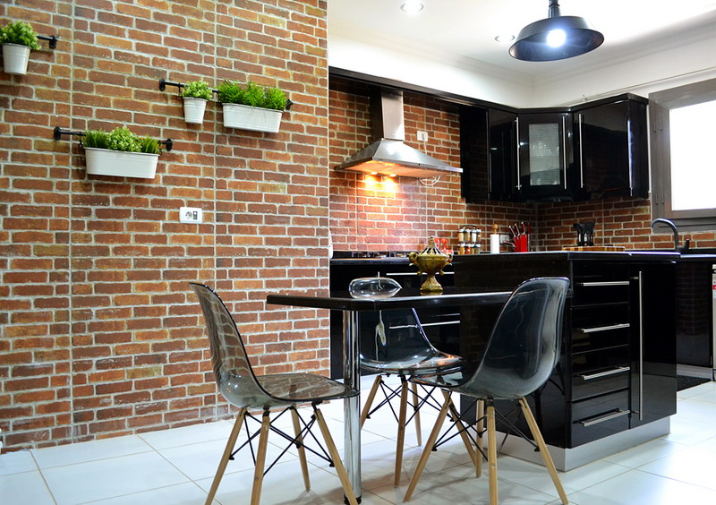 black MDF modern kitchen with dining area