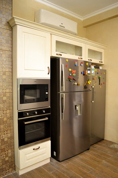 Pitch pine kitchen with built-in appliances