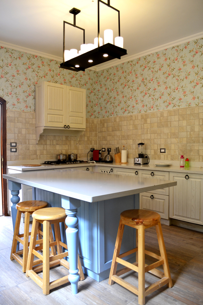 Oak white American kitchen design with island and chairs
