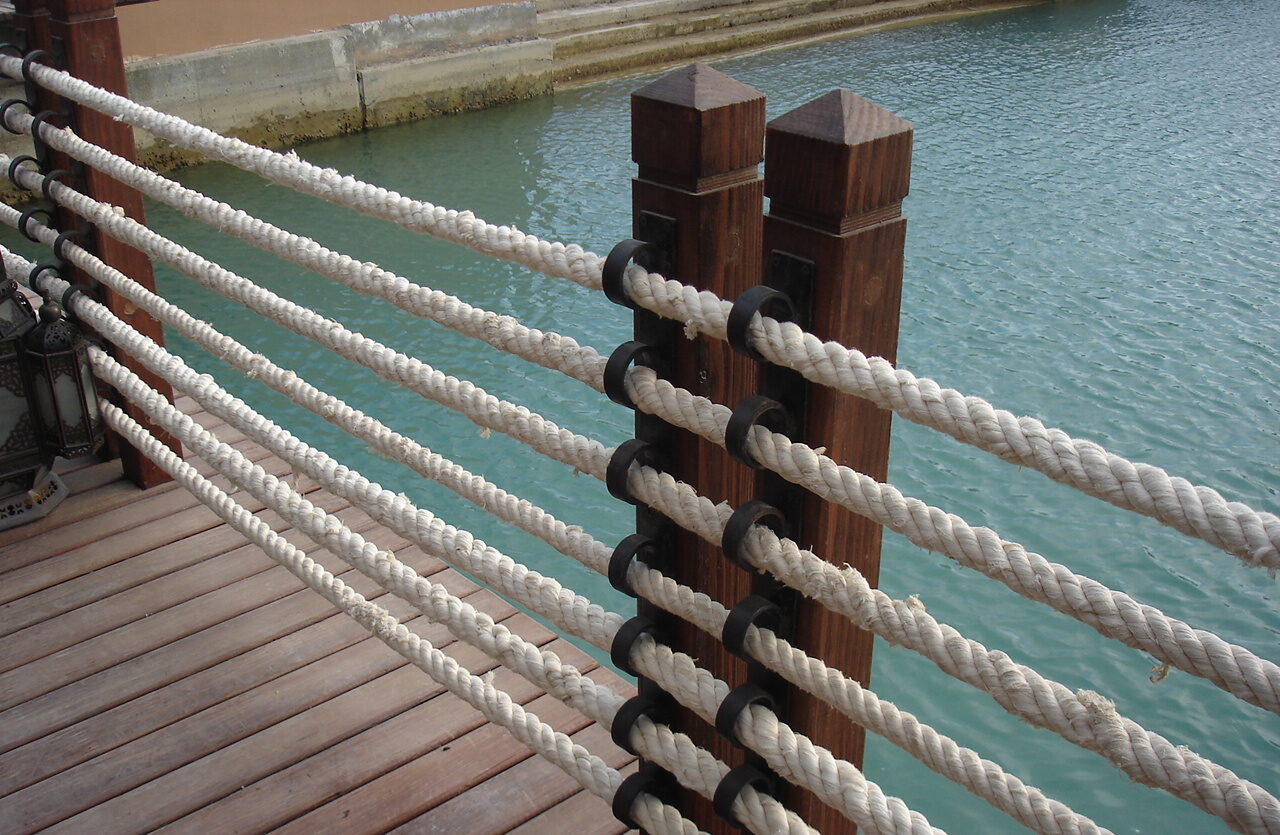 Wooden Deck dock with ropes and poles casbah restaurant port Ghalib hotel