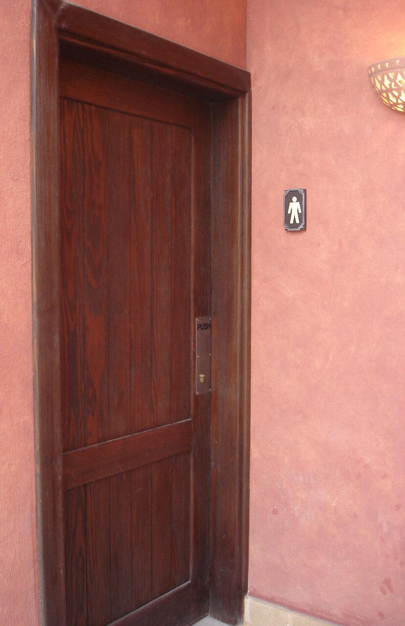 Casbah restaurant port Ghalib hotel wooden restroom door